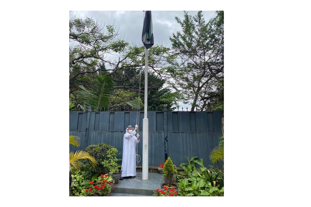 Raising the UAE national Flag