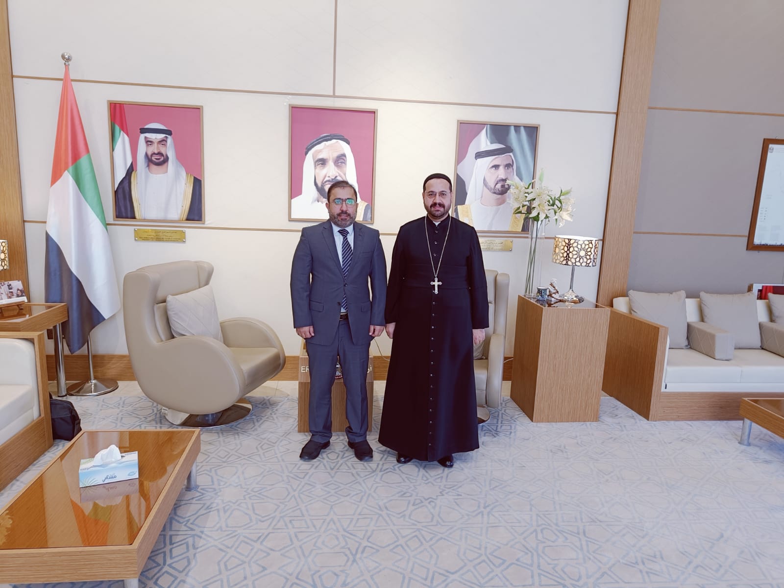 His Excellency Ahmed Al-Dhaheri met Rev. Yacoub Saadi, the priest of the Bartella Church in Nineveh Governorate, and during the meeting they discussed the distinguished bilateral relations between the state and Iraq. At the outset of the meeting, which took place at the Consulate General, Priest Yacoub Saadi praised the role of the United Arab Emirates in promoting the concepts and spirit of tolerance and brotherhood through the Treaty of Human Fraternity, stressing that this derives from the approach of the late Sheikh Zayed bin Sultan Al Nahyan, and the rehabilitation of the individual in Emirates to believe in the values of tolerance.