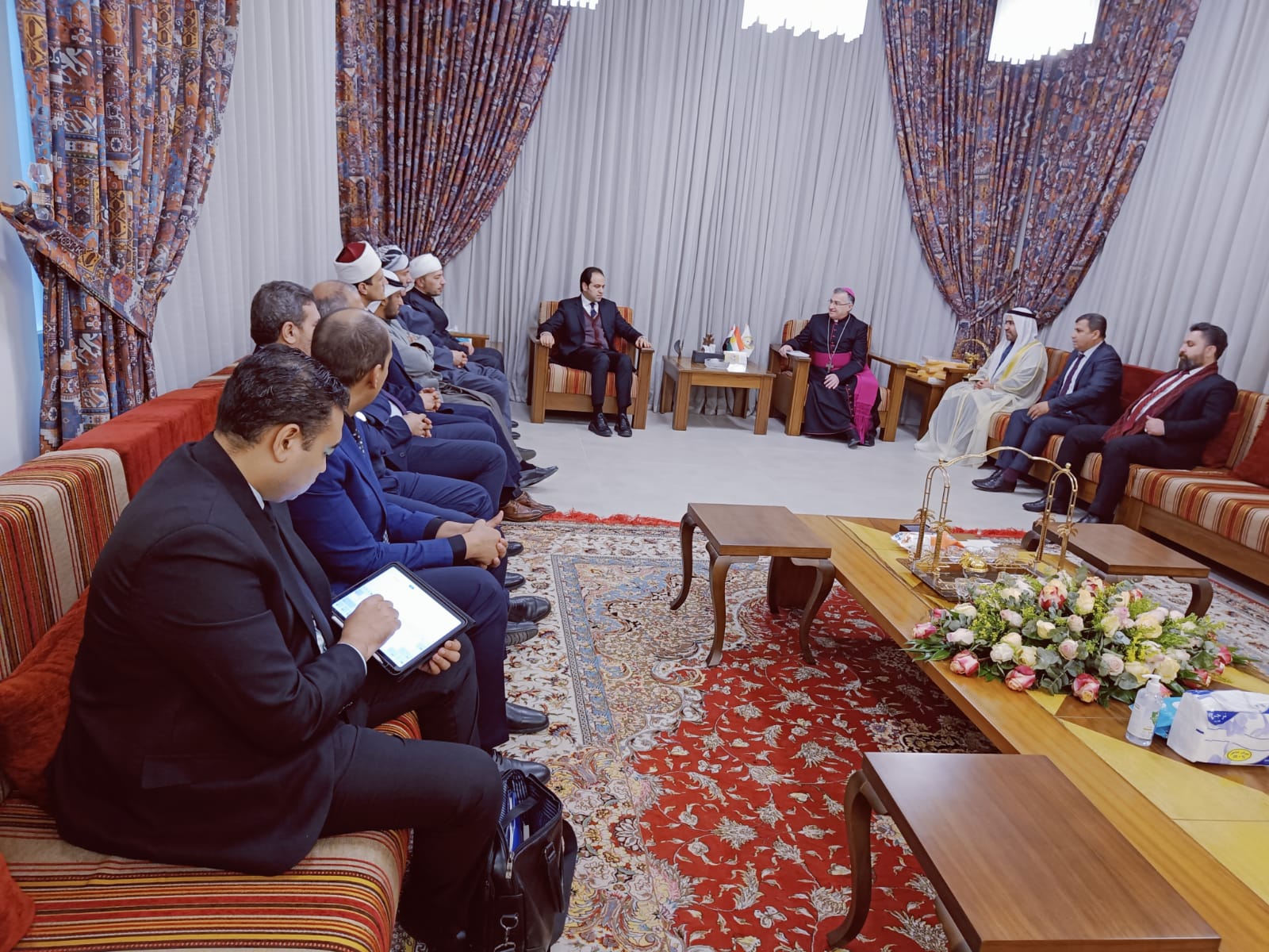 The delegation of the Council of Muslim Elders, headed by His Excellency Muhammad Abd al-Salam, Secretary-General of the Council and in the presence of His Excellency Ahmed Al Dhaheri, Consul General of the State in the Kurdistan Region, visited the Chaldean Catholic Church in Erbil, and was received by Bishop Bashar Matta Warda, Bishop of the Chaldean Catholic Church in Erbil, in order to coordinate joint cooperation in areas of coexistence.